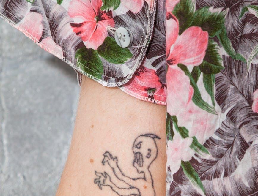 skin human person tattoo plant flower blossom