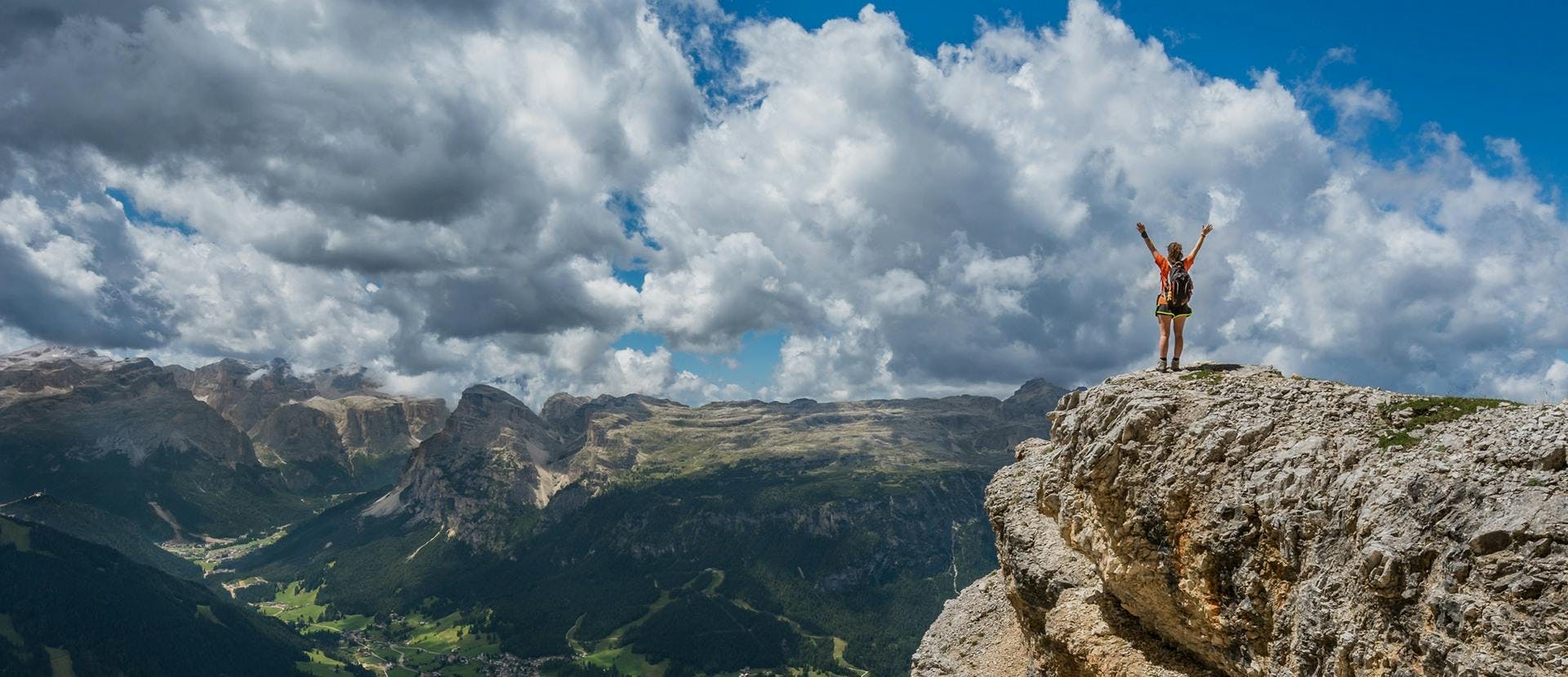 nature outdoors weather cumulus cloud sky cliff person mountain plateau