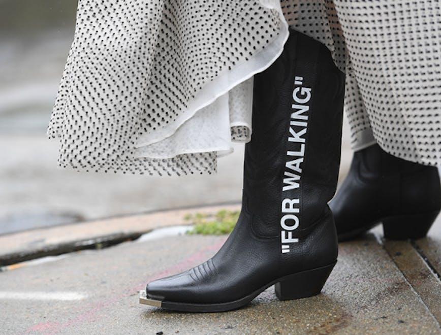 street style spring summer 2019 new york fashion week usa 10 sep 2018 nyfw ss19 alone female not-personality 74422054 apparel clothing footwear boot riding boot