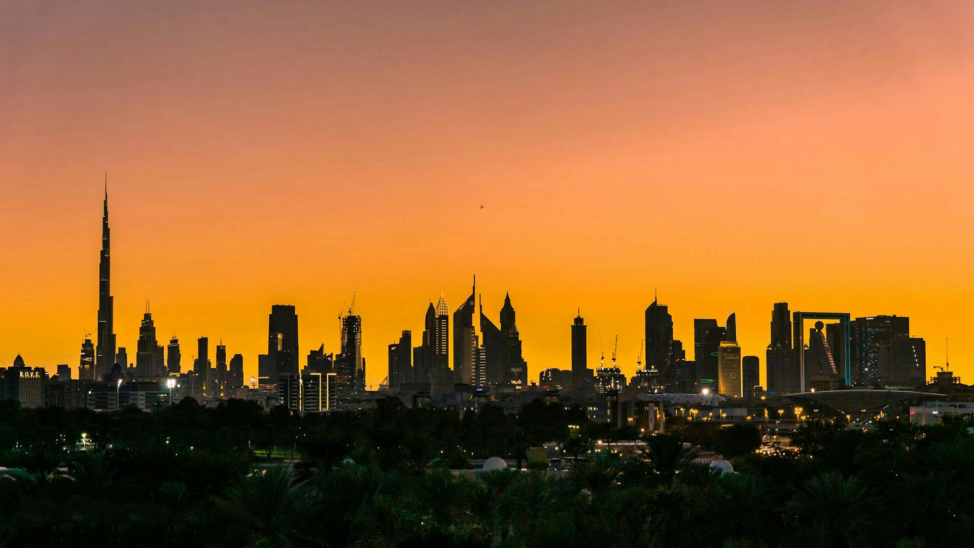 nature outdoors sky sunset urban metropolis building tower spire silhouette