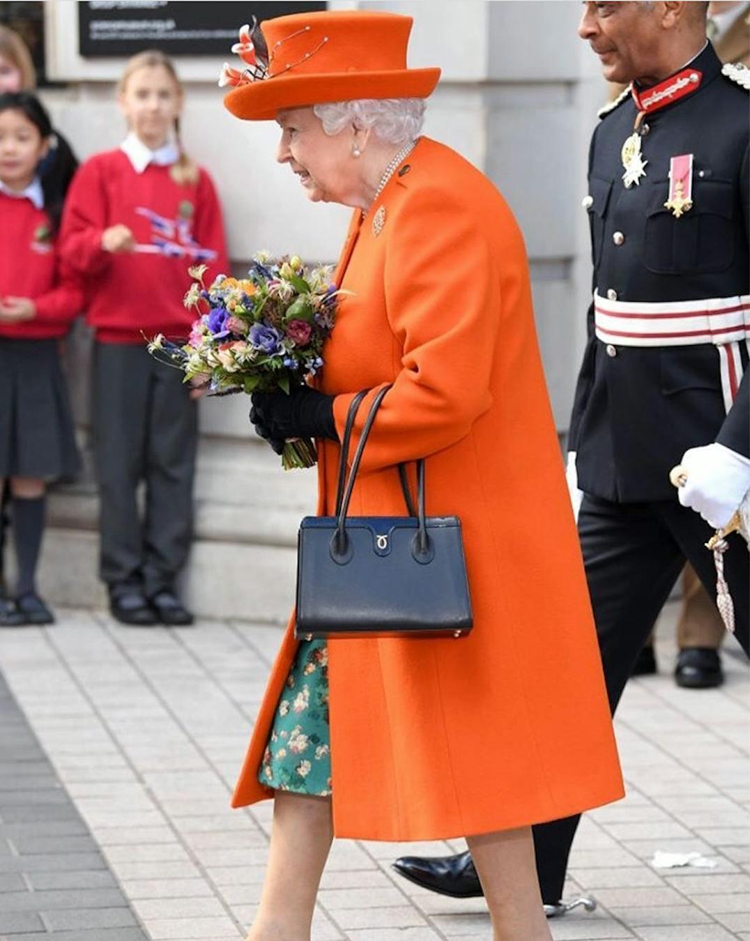 hat clothing person human shoe footwear plant flower bouquet flower flower arrangement