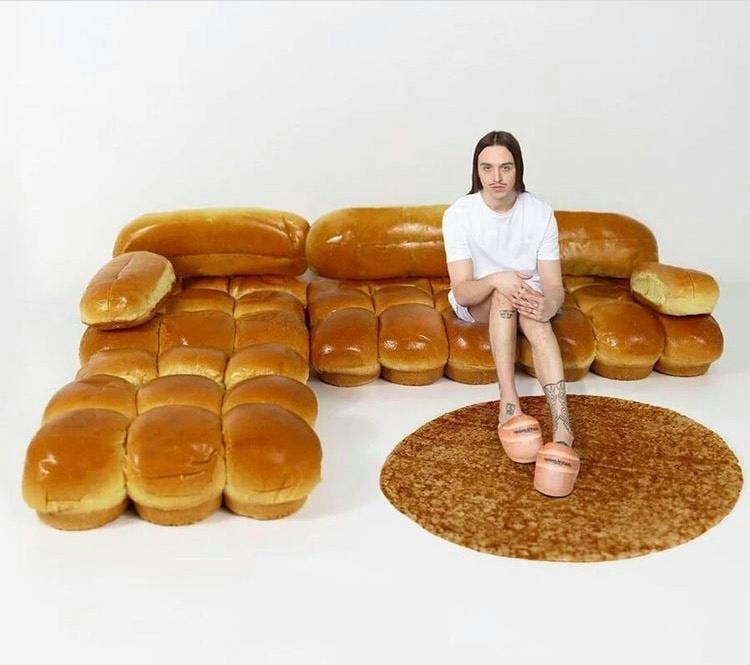 person human bread food bun