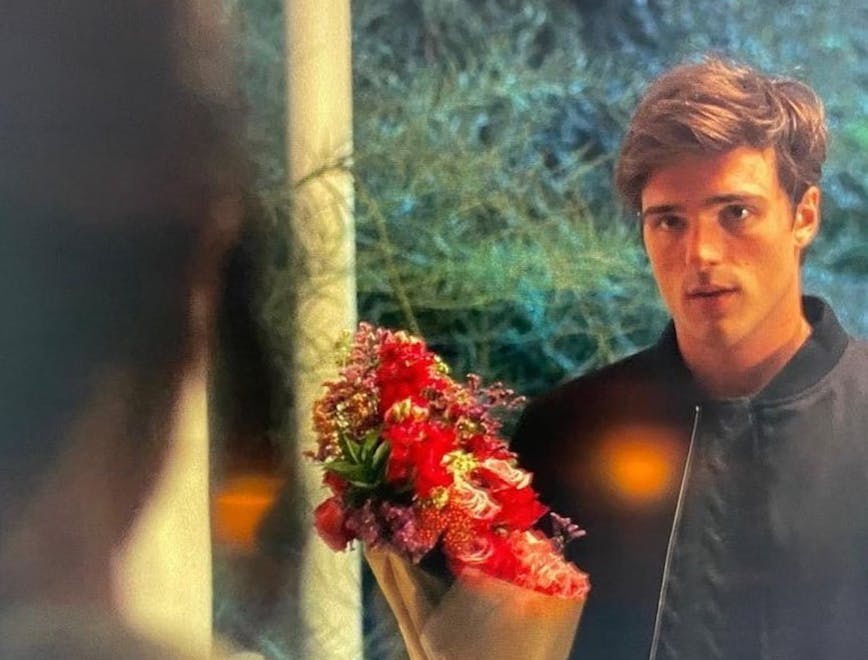 plant person human flower blossom flower bouquet flower arrangement