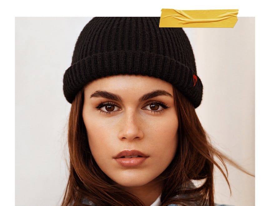 cap clothing hat beanie person face head coat jacket